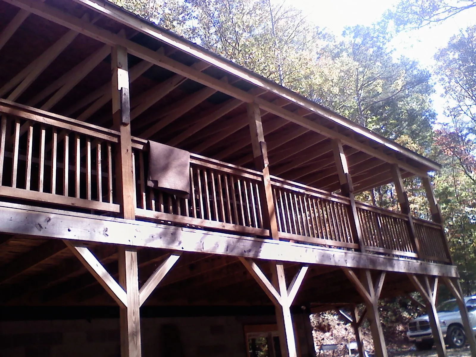 Timber framing under a new elevated porch and deck — Roof Leak Repair in Brattleboro by Roofing Brothers